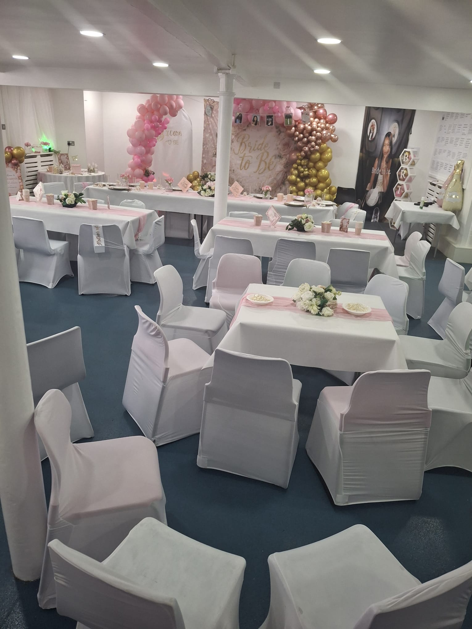Pink and gold bridal shower setup across the Main Hall